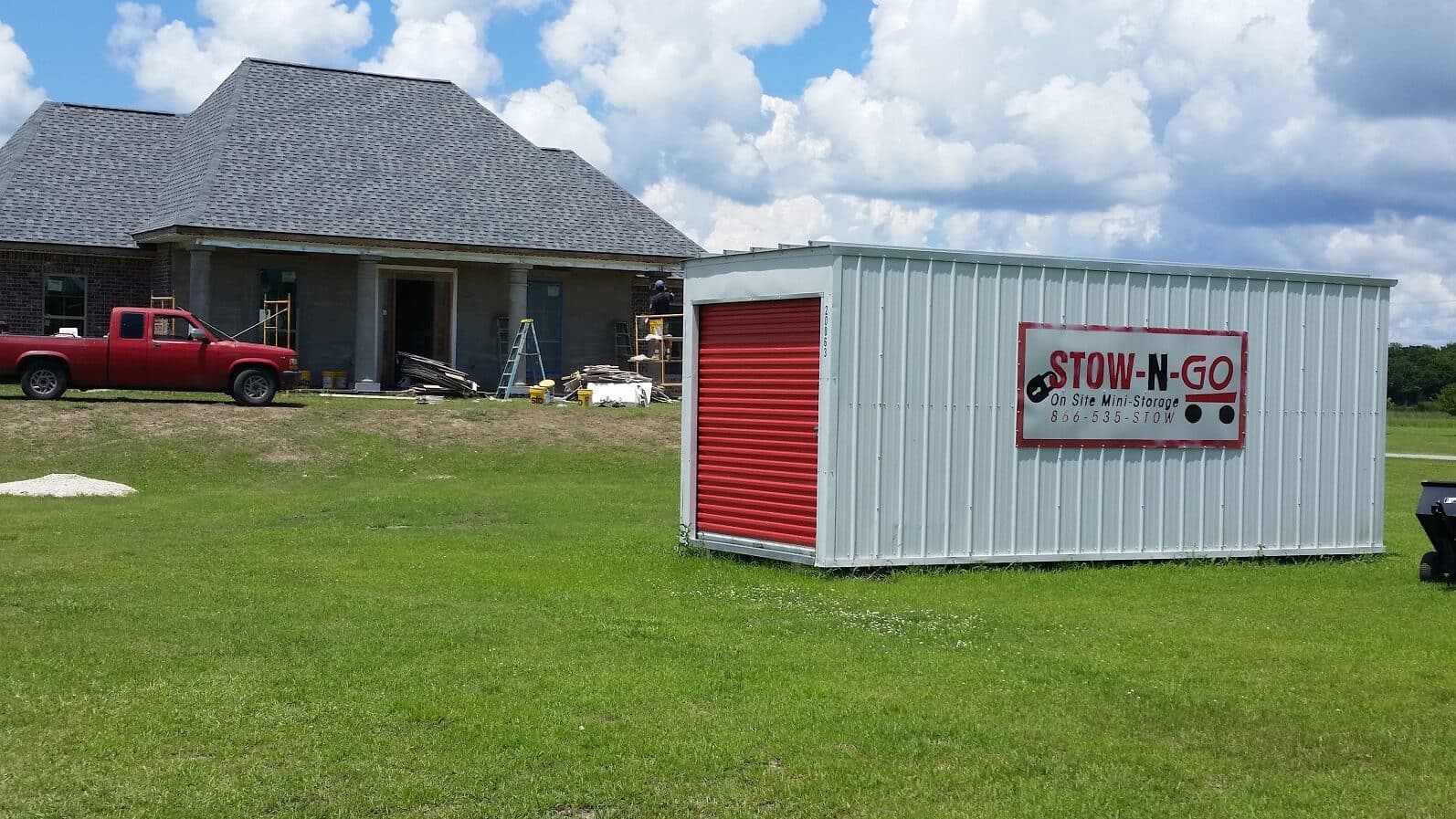 Stow-N-Go portable storage unit delivered to a South Louisiana home driveway